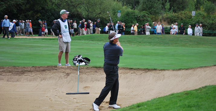 Peter Jacobsen hits out the bunker on hole #5