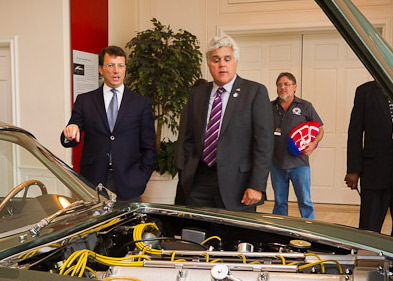 Jay Leno and Museum Director Brian Ferriso look at the cars in the Allure of the Automobile. Photographer: Randy Boverman