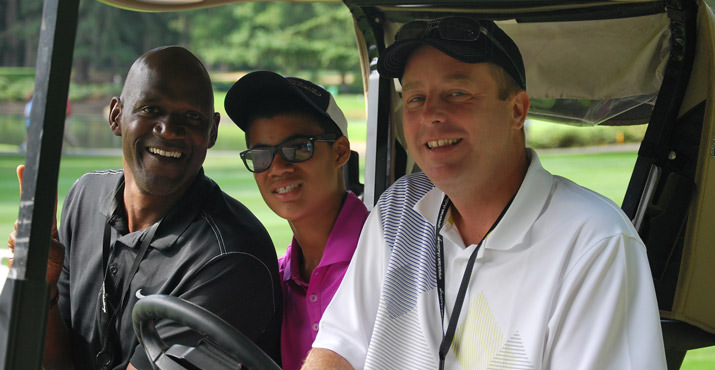 Terry Porter, his son Malcolm, and Mike O'Connell from Peter Jacobsen Sports