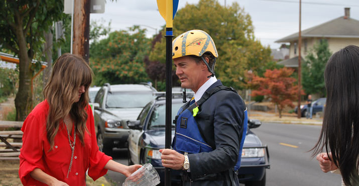 Kyle MacLachlan gets doused with water before a filming