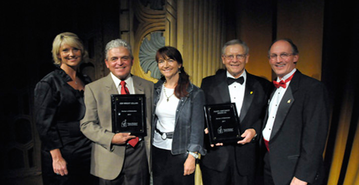 Board Chair Mary Ransome (left) and Executive Director Tom Soma (Right) pose with Partner of Distinction recipients Ken Wright Cellars (represented by Karen and Ken Wright / Center left) and Pacific Northwest Baking (represented by Mike Stevens / center right) recognizing outstanding business involvement with RMHC. 