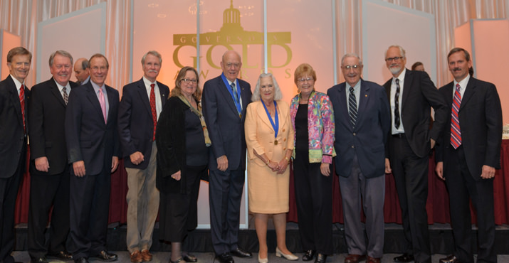 2011 Governors' Gold Awardees (from left to right): Dick Withnell, Steve McCoid, Governor Kulongoski, Governor Kitzhaber, Jean M. Auel, Ken Austin, Joan Austin, Governor Roberts, Governor Atiyeh, Dan Wieden and Steven G. Hackett. 