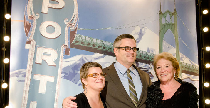 Gala co-chairs Lisa Sedlar, CEO of New Seasons Market (left), and Syd Hannigan, retired Safeway executive (right), pose for the paparazzi with Portland Mayor Sam Adams at “Home Grown,” Oregon Food Bank’s annual gala fundraiser, Oct. 15.