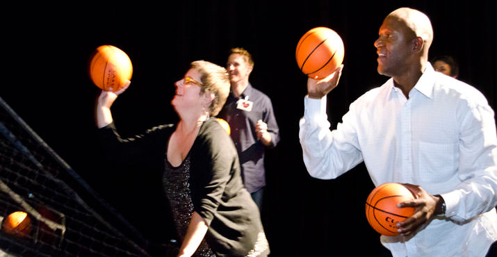 Event Co-Chair Lisa Sedlar, the 5’1” CEO of New Seasons Market,” shoots hoops with special guest former Portland Trail Blazer Terry Porter to raise funds to support Oregon Food Bank’s mission at “Home Grown"