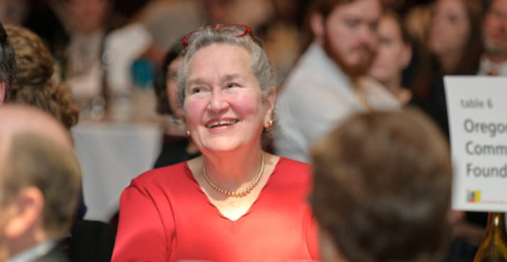 Fran Storrs, at the Oregon Community Foundation Table, enjoys Greg Chaille's stories of his home, which was designed by Fran's late husband, John Storrs.