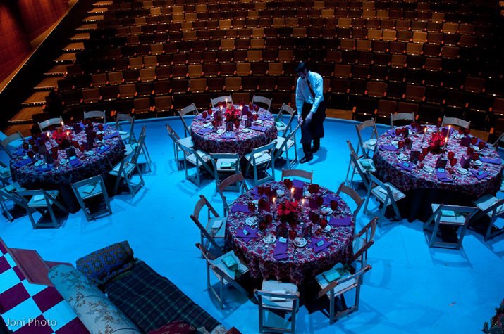 The Armory's Mezzanine is transformed into a scene straight from the production "One Night With Janis Joplin" with tie-dye place mats and flower center pieces