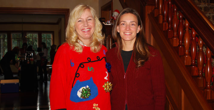 Janet Manneline and Catarina Hunter are good sports in their holiday sweaters