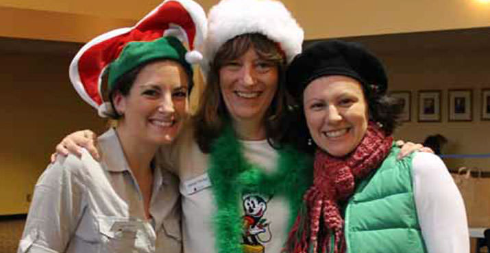 Metropolitan Family Service staff volunteered their time at this year’s Holiday Cheer event. From left, Abby Becic Wood, Deborah Shimkus and Monica Wirtz.