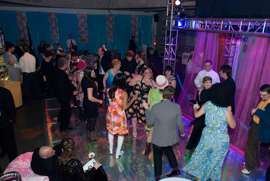 The Armory was transformed into a 60's party.  Guests danced the night away on the glowing dance floor.