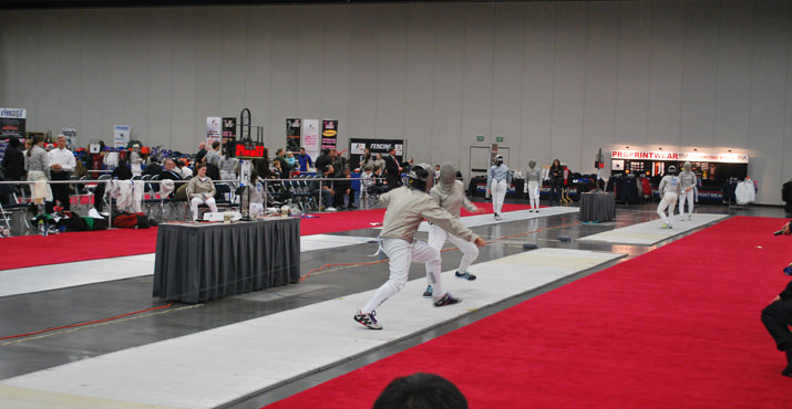 A body cord is necessary to register scoring: it attaches to the weapon and runs inside the jacket sleeve, then down the back and out to the scoring box. In sabre and foil the body cord connects to the lamé in order to create a circuit to the scoring box.