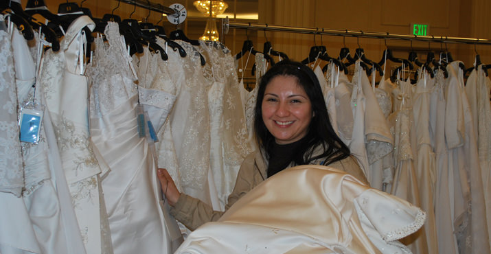 Bathshua Mendoza found an arm load of wedding dresses to try on 
