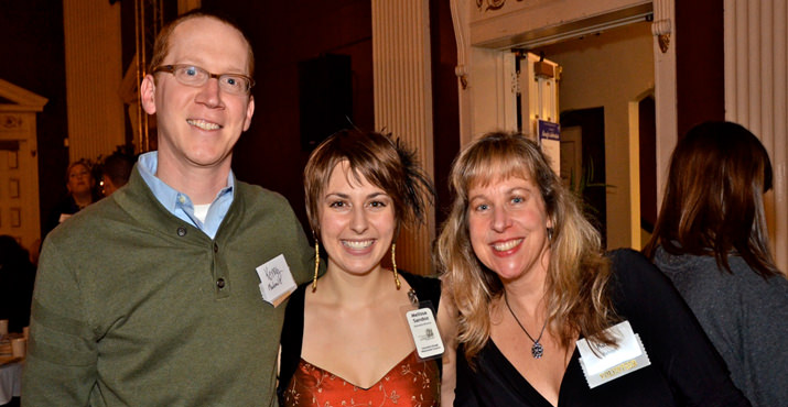 Award video editor and photographer Kenny MacDonald of Recorded History, event coordinator Melissa Sandoz, and volunteer Kathy Balogh pause for a quick photo before running back to work.