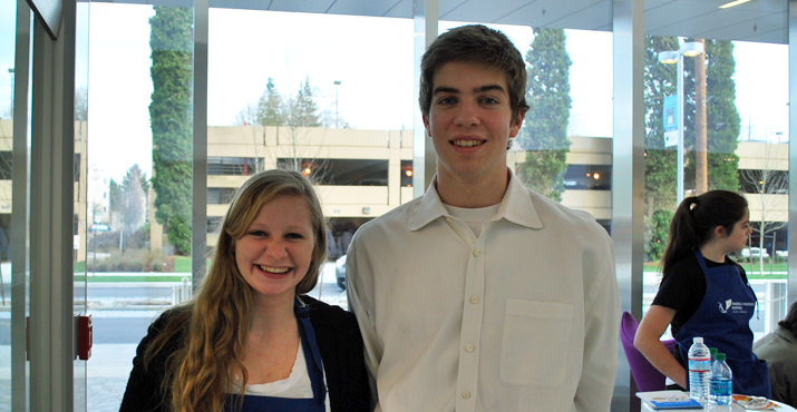 Volunteers Jennifer Mick and Tyler Thompson