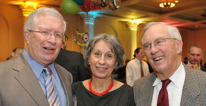 SMART Board Member Steve Wynne of JELD-WEN, Inc. (left) enjoys the social hour reception with SMART Emeritus Board Member Bill Early (right) and his wife Karen (center) at SMART’s 20th Anniversary Celebration Dinner and Auction on February 16, 2012 at the Portland Art Museum.