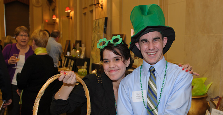 Thomas A. Edison High School students Sophie Bottom and Michael Kilpatrick show their St. Patrick’s Day spirit while volunteering at the Brilliance Benefit.