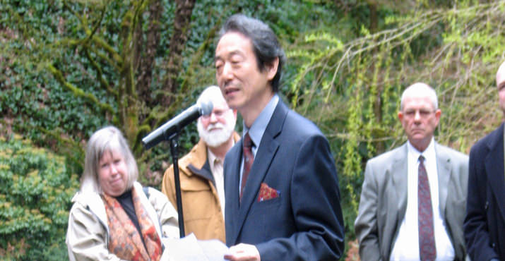  Takamichi Okabe, Consulate-General of Japan in Portland, deliver remarks during the cherry tree planting ceremony at the Portland Japanese Garden as part of the nationwide centennial celebration of the National Cherry Blossom Festival