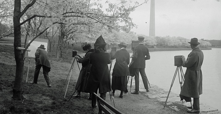 Photographers shooting cherry blossoms along the Tidal Basin in Washington, D.C. on April 4, 1922.