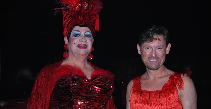 Supporters pulled out all the stops with their attire, snapping up all most of the area's red dresses!