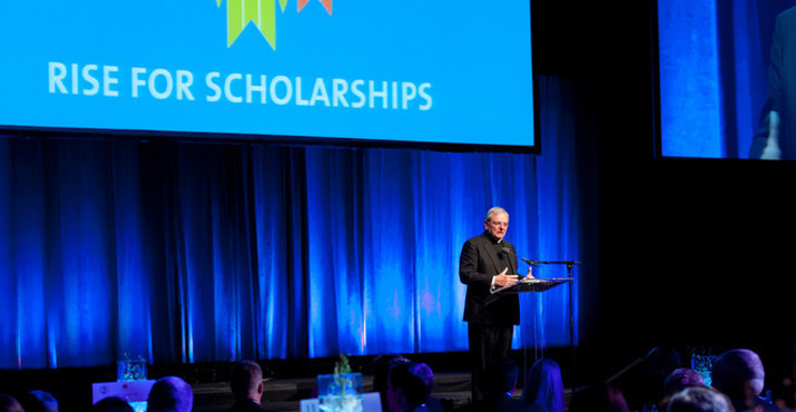 Rev. E. William Beauchamp, C.S.C., president of the University. The RISE for Scholarships event was planned in part to honor Fr. Bill on the occasion of his 30th anniversary as a Holy Cross priest, and his 10th year on the Bluff.