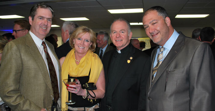 Tim and Lisa Strader with Fr. Patrick Conroy (Who is is a Jesuit Priest who is serving as the 60th Chaplain of the House of Representatives) and Marshall Glickman
