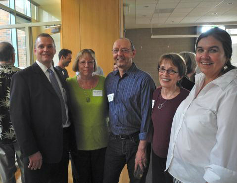 Bryan Baisinger, Belle Landau, Abe Cohen, DC, Carol Levine and Sarah Smith gather together during the social hour and prepare for the start of the movie.