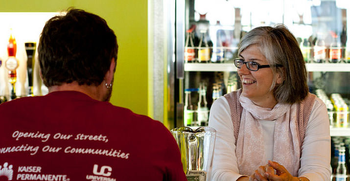 Mellow Mushroom owner Cindy Waters greets a party guest!