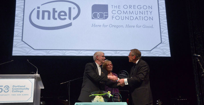  PCC Board Chair Jim Harper presents the Patron Award to Jill Eiland, NW Region Corporate Affairs Manager of Intel, and Eric Parsons, Board Chair of the Oregon Community Foundation