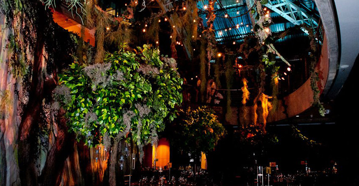 Swamp-like décor adorns the dinner tables inside the historic Armory.  