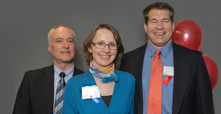 John Prescott, with Intel executives Elisabeth Zeller and Tripp Robinson. Elisabeth Zeller is senior finance and operations manager, Intel Foundation; Tripp Robinson is emergency manager at Intel and is a board member for American Red Cross Oregon Trail Chapter.