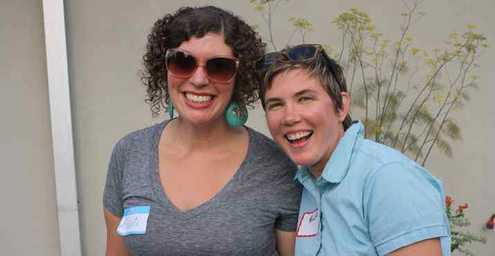 Kristi Yoder and Rachel Ebert laugh while enjoying the atmosphere of the event.