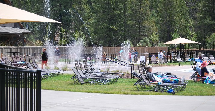 Tot splash & play areas entertain the kids.