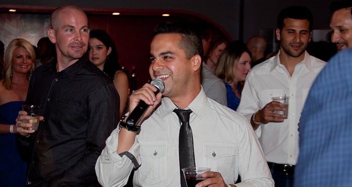 Make-A-Wish Junior Board member and emcee, Danny Decker, leads the crowd in a game of Heads or Tails