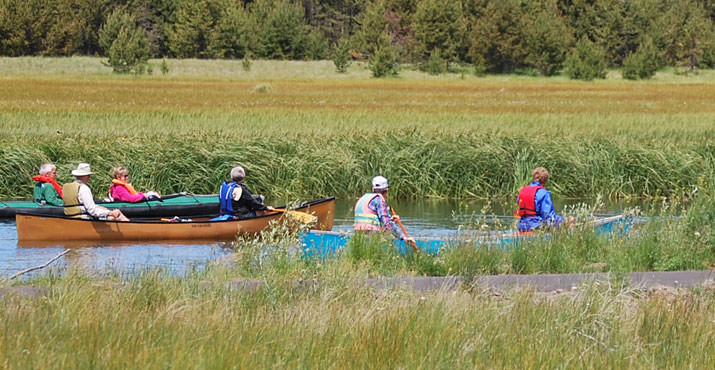 The Deschutes River offers recreational opportunities like fishing and boating.