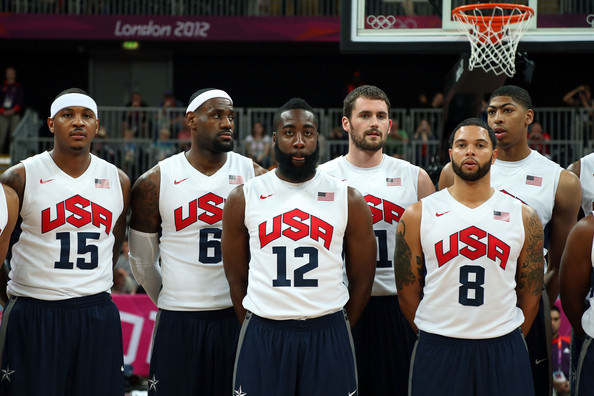 Carmelo Anthony #15, Lebron James #6, James Harden #12, Kevin Love #11, Deron Williams #8 and Anthony Davis #14 of the United States Men's Basketball team poses prior to their game against France on Day 2 of the London 2012 Olympic Games at the Basketball Arena on July 29, 2012 in London, England