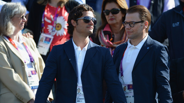 Prince Daniel of Sweden (R) and Prince Carl Philip of Sweden look on during the men's Double Trap Shooting final on Day 6 of the London 2012 Olympic Games at The Royal Artillery Barracks