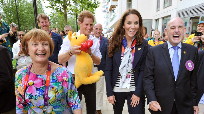 Prince Harry holds a Kangaroo given to him by Australian athletes as he walks with Catherine, Duchess of Cambridge, MP Tessa Jowell (L) and Mayor of the Olympic Village Sir Charles Allen (R) during a visit to the Team GB accommodation in the Athletes Village on Day 4 of the London 2012 Olympic Games.