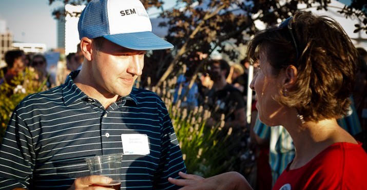 SEMpdx Advisory Board Member, David Mihm, and Social Media Director for Charlie Hales for Portland Mayor, Mary Breslin Nichols, talk shop at the sellout SEMpdx Rooftop Networking Party