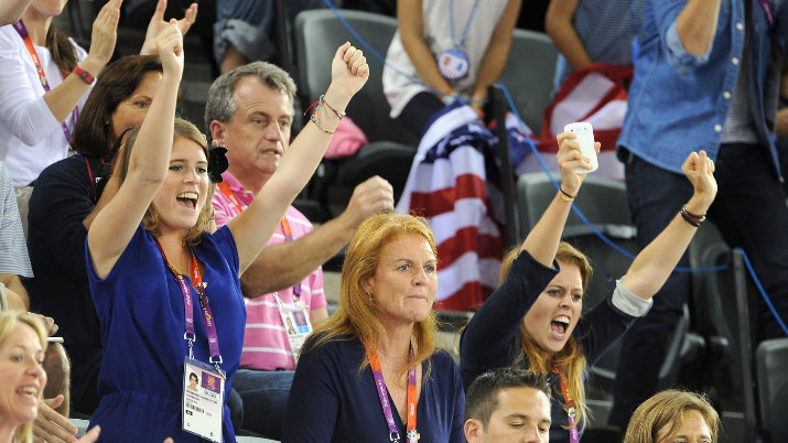 Sarah Ferguson, Duchess of York with her daughters Princess Eugenie (L) and Princess Beatrice enjoy the atmosphere as they watch the Track Cycling on Day 11 of the London 2012 Olympic Games at the Velodrome.