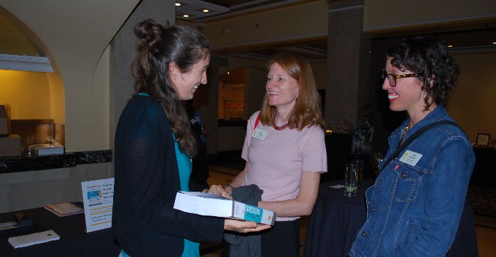 Alice Forbes, Nonprofit Association of Oregon Interim Executive Director and Alissa Beddow, Nonprofit Association of Oregon Communications & Design Coordinator take take a look at the new book.