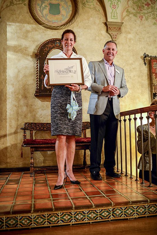 DoveLewis CEO, Ron Morgan presented Kim Bradley with an artist’s rendering of her historic home in appreciation of hosting the evening celebration.