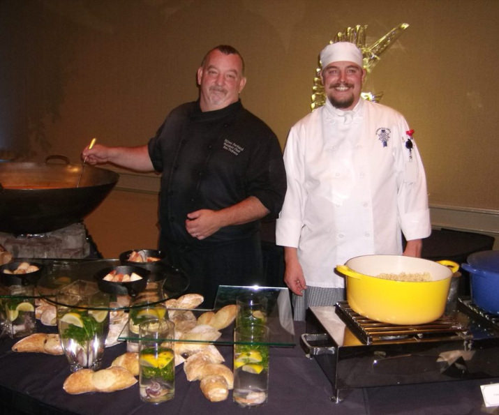 Chef Ken Dubane and student assistant from Le Cordon Bleu College of Culinary Arts Portland – Sautéed Shrimp-Crab-Mussels-Calamari-Clams Bouillabaisse, Blue Cheese & Endive, Baby Iceberg Salad and Couscous.