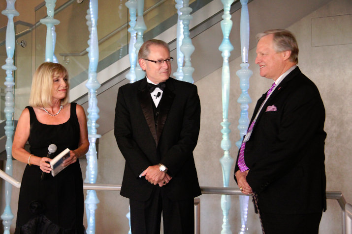 Emcees Kim Singer and Larry Shoop with celebrity host David Frei, television host of the Westminster Dog Show.