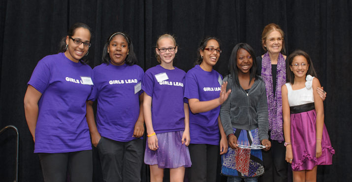 Students from 'Girls Lead'--a group from the recently closed Harriet Tubman Leadership Academy for Young Women were invited to join Gloria on stage!