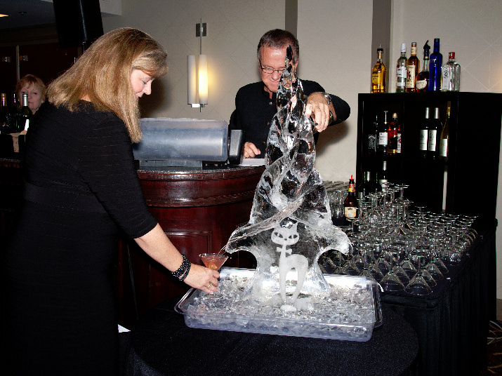 Kris Otteman, CAT Board President, trying out the Whisker drink luge