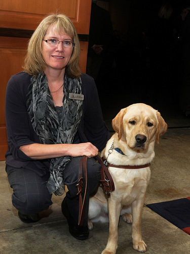 Guide Dogs for the Blind veterinarian Dr. Patti Van de Coevering and Arnie.