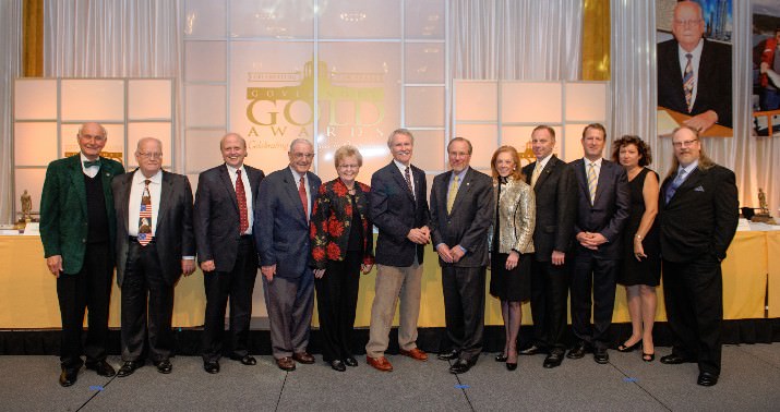 This year’s Governor Gold Awardees listed from left to right – Orville Roth from Roth’s Fresh Markets. Joe Weston, Wally Rhines from Mentor Graphics, Governor Victor Atiyeh, Governor Barbara Roberts, Governor John Kitzhaber, Governor Theodore Kulongoski, Tamara Lundgren from Schnitzer Steel Industries, Chip Terhune from Schnitzer Steel Industries, Gary Fish from Deschutes Brewery, Leesa Cobb and Aaron Longton from Port Orford Ocean Resource Team.