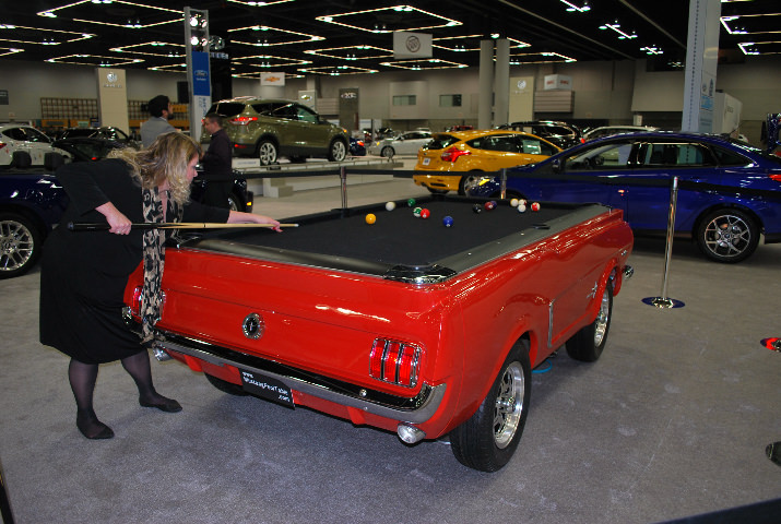 Katy Young tried her hand at pool on a one-of-a-kind Mustang table.