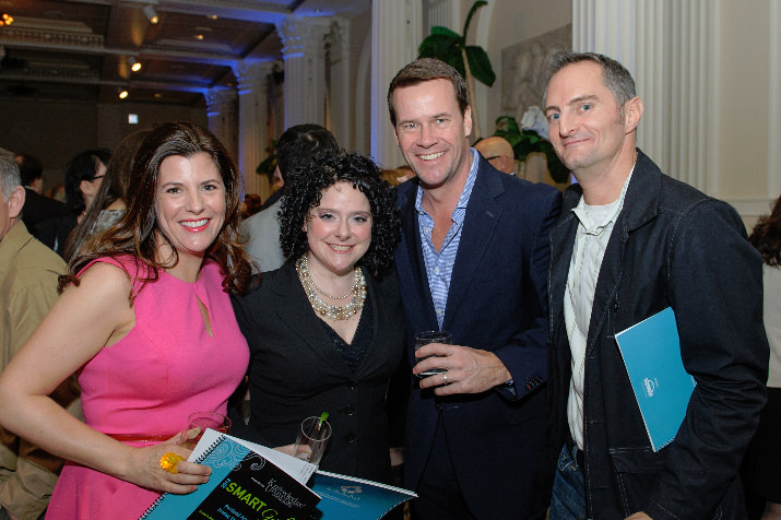 Tori O’Keefe enjoys the social hour with SMART Board Member Michele Daterman, Tom O’Keefe and Kent Lewis.