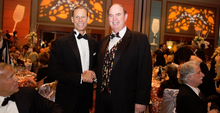 George Hosfield, CIO, Ferguson Wellman Capital Management and CWA Board Chair, congratulates fellow CWA Board member and 2013 Auction Co-Chair, Keith Barnes of Barnes Capital Management on the successful event.