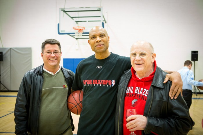 Alan McMurtry, Former Portland Trailblazer Darnell Valentine, and Bill Frank take a moment between basketball shots for a photo together